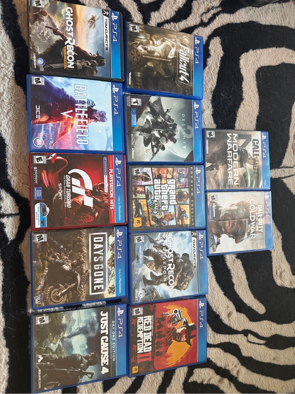 Sony PS4 Game Collection with Blue Cases - Assorted Titles